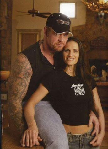 Jodi Lynn Calaway's ex-husband, The Undertaker, with his second wife, Sara Calaway.